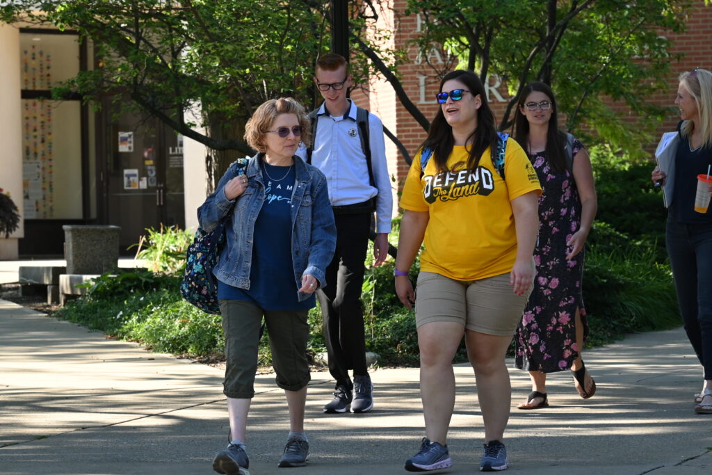 MAHG students walk by Library